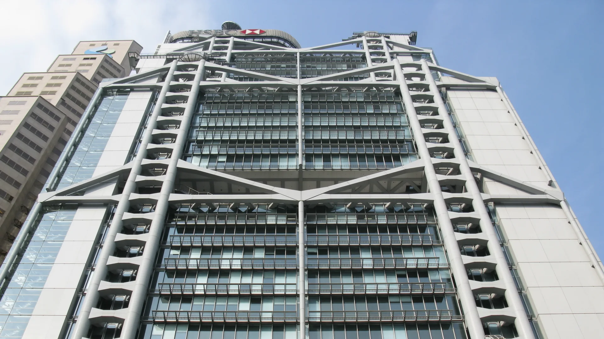HSBC Main Building in Central, Hong Kong, with its exposed structural frame and rooftop HSBC sign