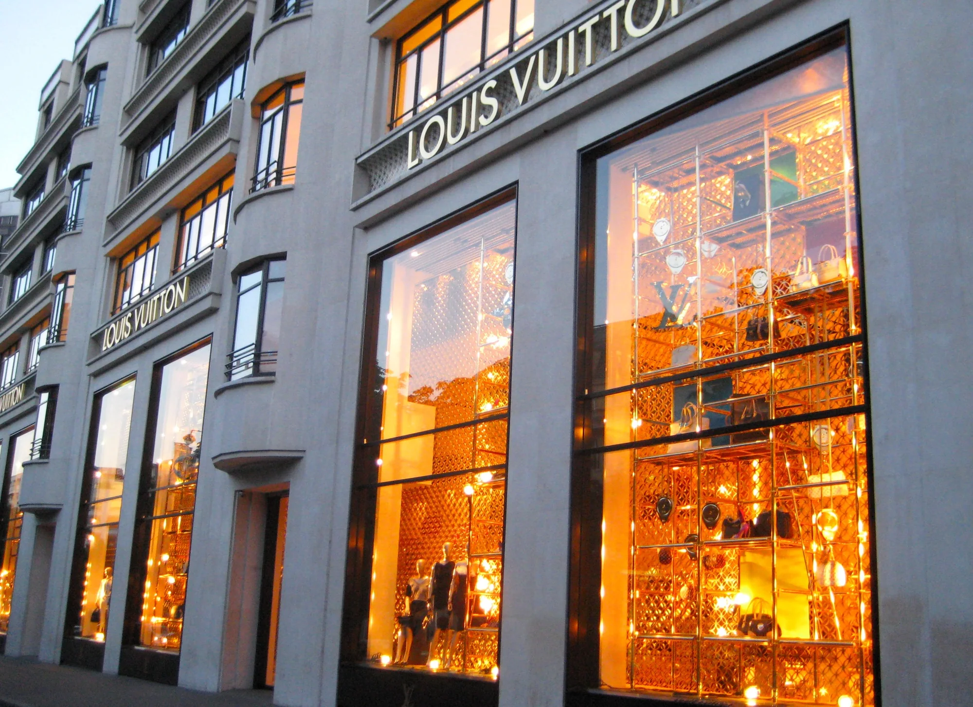 Louis Vuitton flagship on the Champs-Élysées in Paris, showing luxury retail scale and distinctive Maison architecture